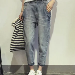 Jean femme coupe carotte à taille mi-haute style décontracté