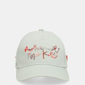 Casquette verte avec nœud rouge